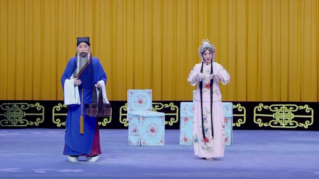 京剧《御碑亭》剧中老生与青衣对谈场面(央视《中国京剧像音像集萃》截帧)
